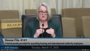 a woman speaking into a microphone