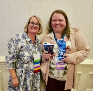 Community Development Assistant Director Kristen Scobie with Executive Director Melissa Taphorn 